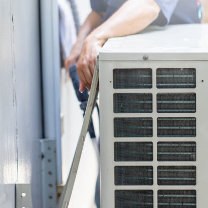 HVAC SuppliesA panel of the back of a HVAC unit being installed.